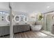 Luxurious main bathroom with soaking tub, glass shower, double vanity, and modern fixtures at 30 Capistrano Dr, Ormond Beach, FL 32176