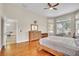 Spacious main bedroom featuring hardwood floors, natural light, and a neutral color palette at 339 Hammock Dunes Pl, Orlando, FL 32828