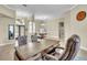 Open floor plan with an office in view, leading to a well-lit dining area at 339 Hammock Dunes Pl, Orlando, FL 32828