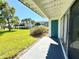 Exterior view of a back porch overlooking green space, trees and other buildings at 4405 S Semoran Blvd # 4, Orlando, FL 32822