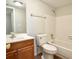 Bathroom featuring a vanity, toilet, and shower/tub combo at 4405 S Semoran Blvd # 4, Orlando, FL 32822