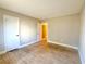 Bright bedroom featuring tile floors and a door to another room at 4405 S Semoran Blvd # 4, Orlando, FL 32822