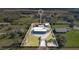 Sprawling country estate featuring barn with ample acreage and mature trees, perfect for peaceful living at 4640 Hickory Tree Rd, St Cloud, FL 34772