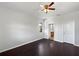 Spacious bedroom featuring a ceiling fan and a window letting in natural light at 4841 Hickory Stream Ln, Mulberry, FL 33860