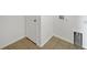 Well-lit laundry room area with tile flooring and washer/dryer hookups at 4841 Hickory Stream Ln, Mulberry, FL 33860