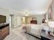 Well-lit main bedroom features wood floors, and closet spaces at 5050 Shorewood Landing Ln, Oviedo, FL 32765