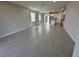 Spacious open-concept living space with recessed lighting and views to kitchen at 5268 Teirgarten St, St Cloud, FL 34771