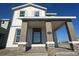 Charming home featuring a covered porch with stone accents and a welcoming facade at 5330 Center Lake, St Cloud, FL 34771