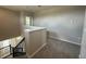 Open second floor hallway with carpet and views of the stairs at 5330 Center Lake, St Cloud, FL 34771
