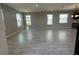 Spacious living area featuring tile floors and multiple windows, creating a bright and airy atmosphere at 5330 Center Lake, St Cloud, FL 34771