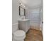Bathroom features a vanity, mirror, medicine cabinet and shower with a decorative butterfly curtain at 5943 Sunderland Dr, Orlando, FL 32812
