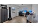 Bright office space featuring tile floors, an adjustable air conditioner, and multiple computer monitors at 5943 Sunderland Dr, Orlando, FL 32812