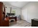 Bedroom including desk, shelving and closet at 6672 S Goldenrod Rd # 132B, Orlando, FL 32822