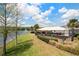 Community playground near a lake offers a perfect space for outdoor fun and recreation for families at 6672 S Goldenrod Rd # 132B, Orlando, FL 32822