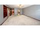 Large primary bedroom with a ceiling fan and multiple doorways at 810 Alex Ln, Deltona, FL 32738