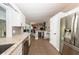 Modern kitchen featuring stainless steel appliances, granite countertops, and wine refrigerator at 810 Alex Ln, Deltona, FL 32738