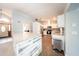 Bright kitchen with stainless steel appliances, granite countertops, and center island at 810 Alex Ln, Deltona, FL 32738