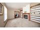 Cozy living room with built-in bookshelves and a fireplace at 810 Alex Ln, Deltona, FL 32738