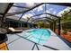 Enclosed pool area featuring a sparkling pool, deck chairs, and access to the home at 810 Alex Ln, Deltona, FL 32738