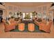 Inviting lobby area with comfortable seating, lush plants, and large windows, creating a bright and welcoming atmosphere at 8110 Princess Palm Ln, Kissimmee, FL 34747