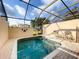 Secluded screened-in pool and patio area, providing a tranquil outdoor experience at 8110 Princess Palm Ln, Kissimmee, FL 34747