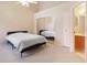 Bright bedroom with ceiling fan and large closet, plus ensuite bathroom at 900 Northern Dancer # 204, Casselberry, FL 32707