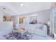 Spacious living room flowing into dining area, great for entertaining, filled with natural light at 900 Northern Dancer # 204, Casselberry, FL 32707