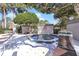 Hot tub surrounded by lounge chairs, lush landscaping and an iron fence at 900 Northern Dancer # 204, Casselberry, FL 32707