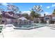 Community pool with beautiful clubhouse and lounge chairs, perfect for relaxation and recreation at 900 Northern Dancer # 204, Casselberry, FL 32707