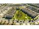 Beautiful aerial view of the neighborhood with large green space and well-maintained homes at 10038 Verse Aly, Winter Garden, FL 34787