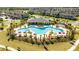 Breathtaking aerial view featuring the community pool, playground, green spaces and well-planned neighborhood layout at 10038 Verse Aly, Winter Garden, FL 34787