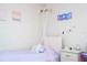 A bedroom with cute decor, overhead canopy, and accents at 10038 Verse Aly, Winter Garden, FL 34787