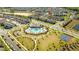 High altitude aerial of neighborhood with amenities including community pool, clubhouse, playground and basketball court at 10038 Verse Aly, Winter Garden, FL 34787