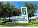 Stone community entrance sign featuring 'Storey Grove' offers a welcoming and established sense of community at 10038 Verse Aly, Winter Garden, FL 34787