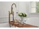 Bathroom showcasing elegant fixtures, including a wooden tray holding flowers and drinks at 11019 Kentmere Ct, Windermere, FL 34786