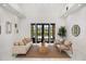 Spacious living room with high ceilings, bright light, and outdoor views through sliding glass doors at 11019 Kentmere Ct, Windermere, FL 34786