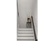 Stairway with white stairs, gray treads, and a decorative vase display at 11019 Kentmere Ct, Windermere, FL 34786