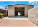 Barn with an open entrance, showcasing a glimpse of a lake view through the structure at 11632 Lake Willis Dr, Orlando, FL 32821