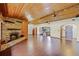Spacious open-concept living room, fireplace, and views of the kitchen at 11632 Lake Willis Dr, Orlando, FL 32821