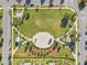 An aerial view of a park showcasing green spaces, walking paths, and beautifully landscaped areas at 12127 Sonnet Ave, Orlando, FL 32832