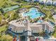 Aerial view of the community center, showcasing the pool, tennis courts, and gathering areas for residents at 12127 Sonnet Ave, Orlando, FL 32832