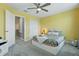 Cozy and sunny bedroom with carpeted floors and modern furniture at 12127 Sonnet Ave, Orlando, FL 32832