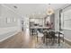 Chic dining area adjacent to the kitchen features stylish lighting and modern decor throughout at 12127 Sonnet Ave, Orlando, FL 32832