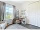 Bright bedroom with a nice window and a set of decorative wall art at 1271 Thoroughbred Trl, Sanford, FL 32771