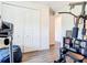 Home gym with closet and doorway leading to other rooms in the house at 1271 Thoroughbred Trl, Sanford, FL 32771