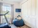Home gym featuring a treadmill, beanbag chair, and closet at 1271 Thoroughbred Trl, Sanford, FL 32771