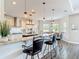 Stylish kitchen featuring granite countertops, island seating, and stainless appliances for modern living at 1271 Thoroughbred Trl, Sanford, FL 32771