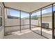 Spacious screened patio with view of fenced backyard at 12977 Borland St, Windermere, FL 34786