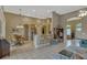 Open-concept kitchen features a bar, dining area, tile floors, and recessed lighting at 13111 Meergate Cir, Orlando, FL 32837