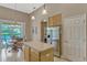 Well-appointed eat-in kitchen with stainless appliances and an island at 13111 Meergate Cir, Orlando, FL 32837
